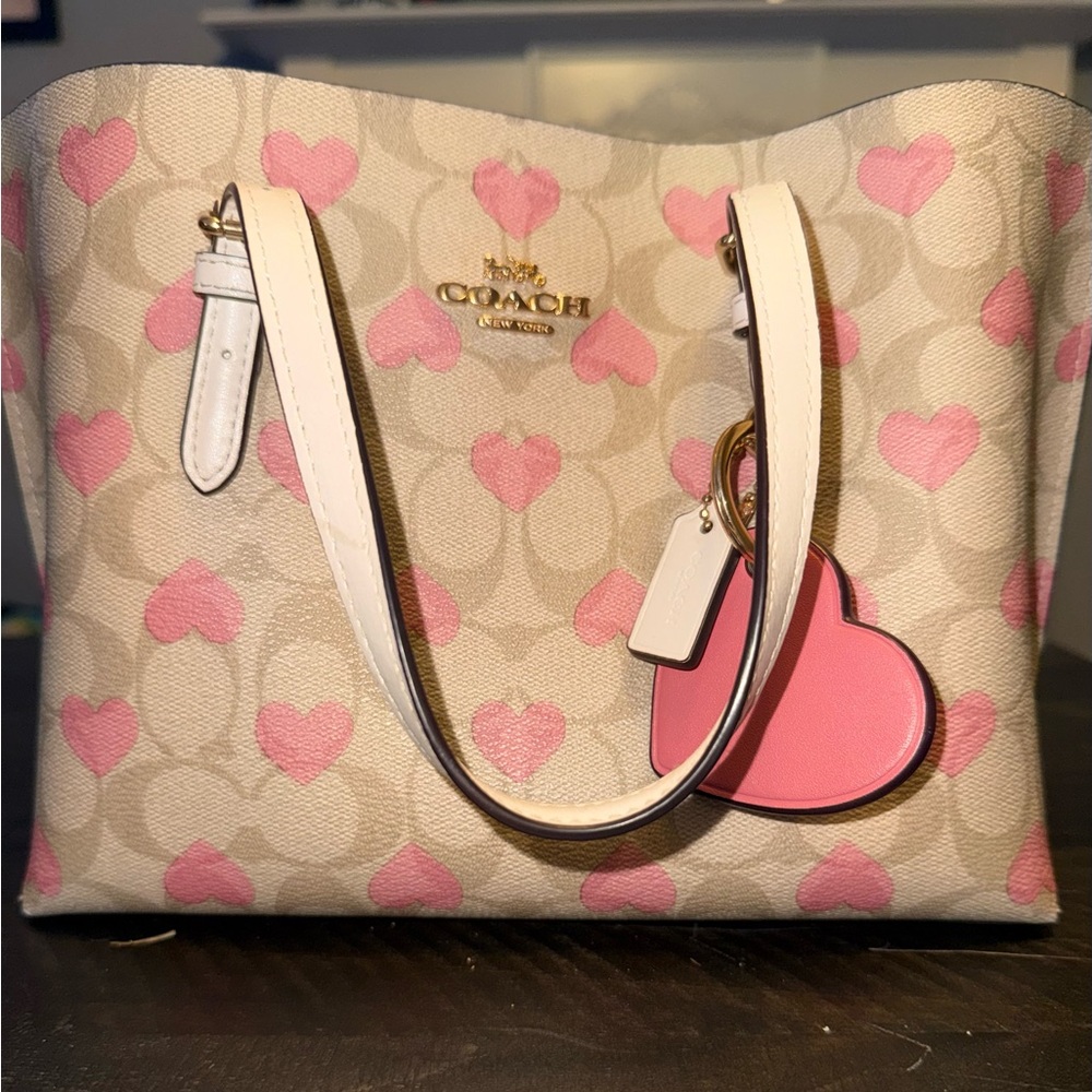 Coach Mollie Tote-Heart Print and Pink Heart Bag Charm
Gently Used